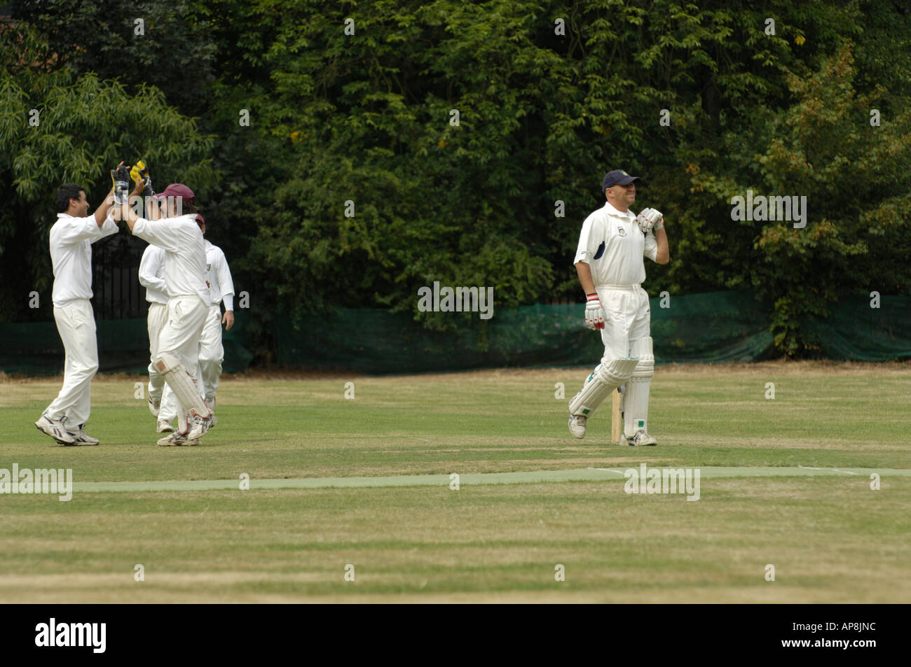 Batsman leaving crease Stock Photo
