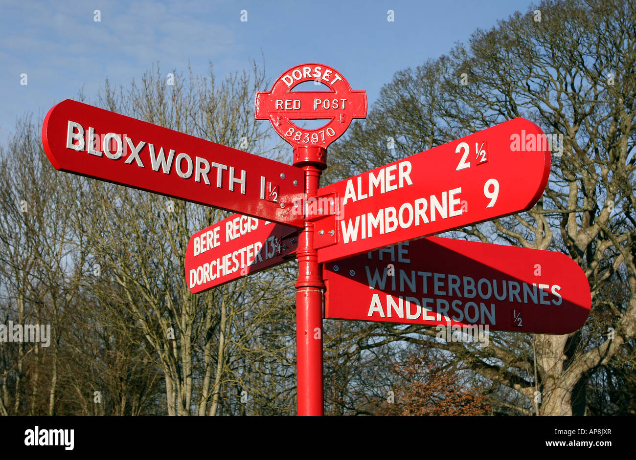 Traditional Dorset Fingerpost freshly repainted red at Almer Stock Photo Alamy