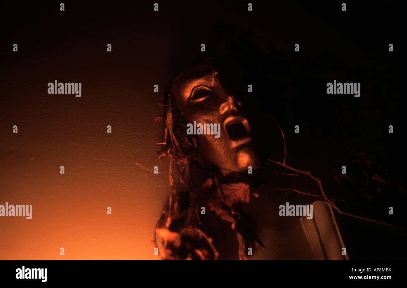 ghostly mask on wall Stock Photo