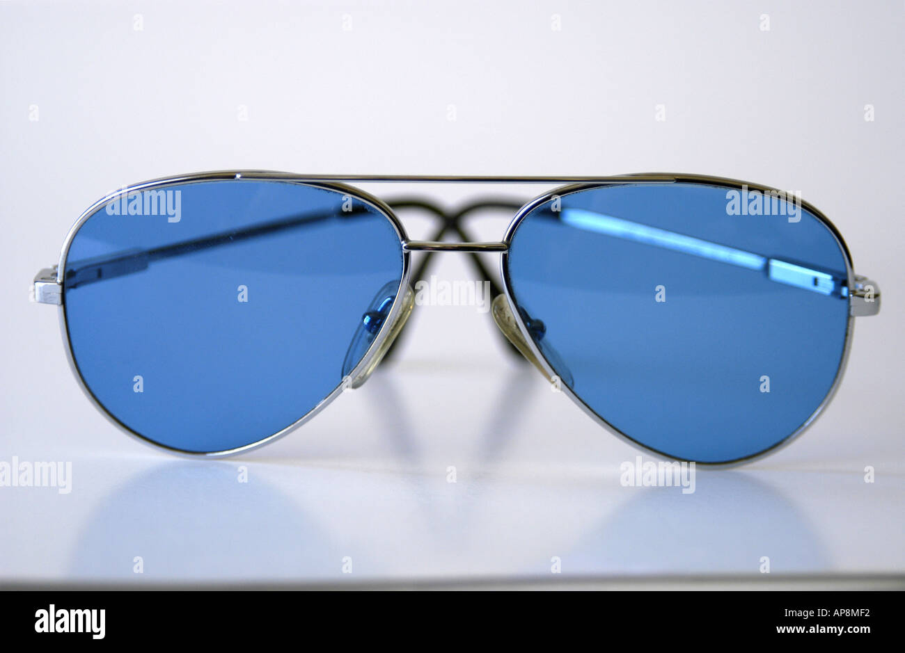 Blue lens sunglasses Stock Photo Alamy