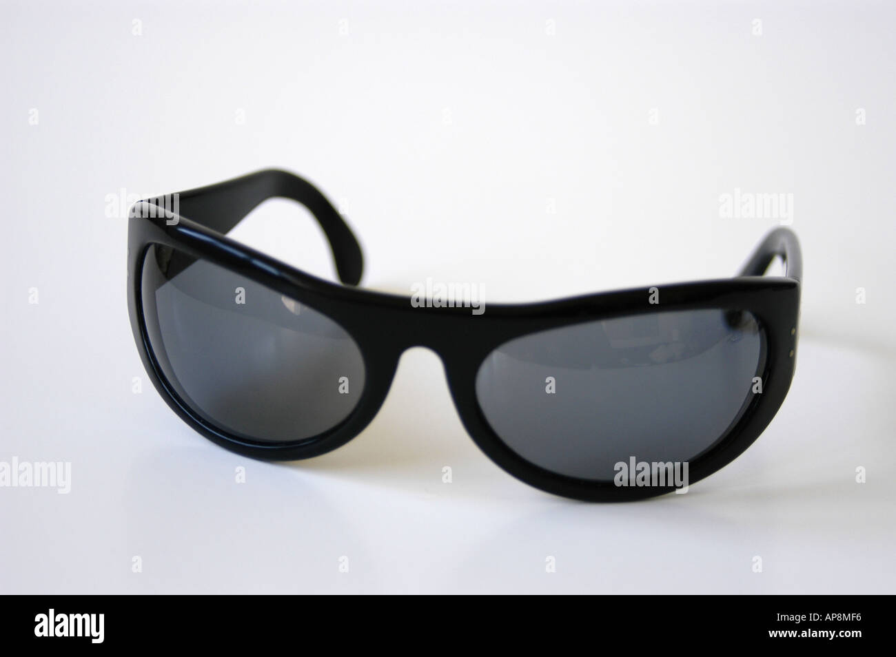 Black wrap around sunglasses Stock Photo