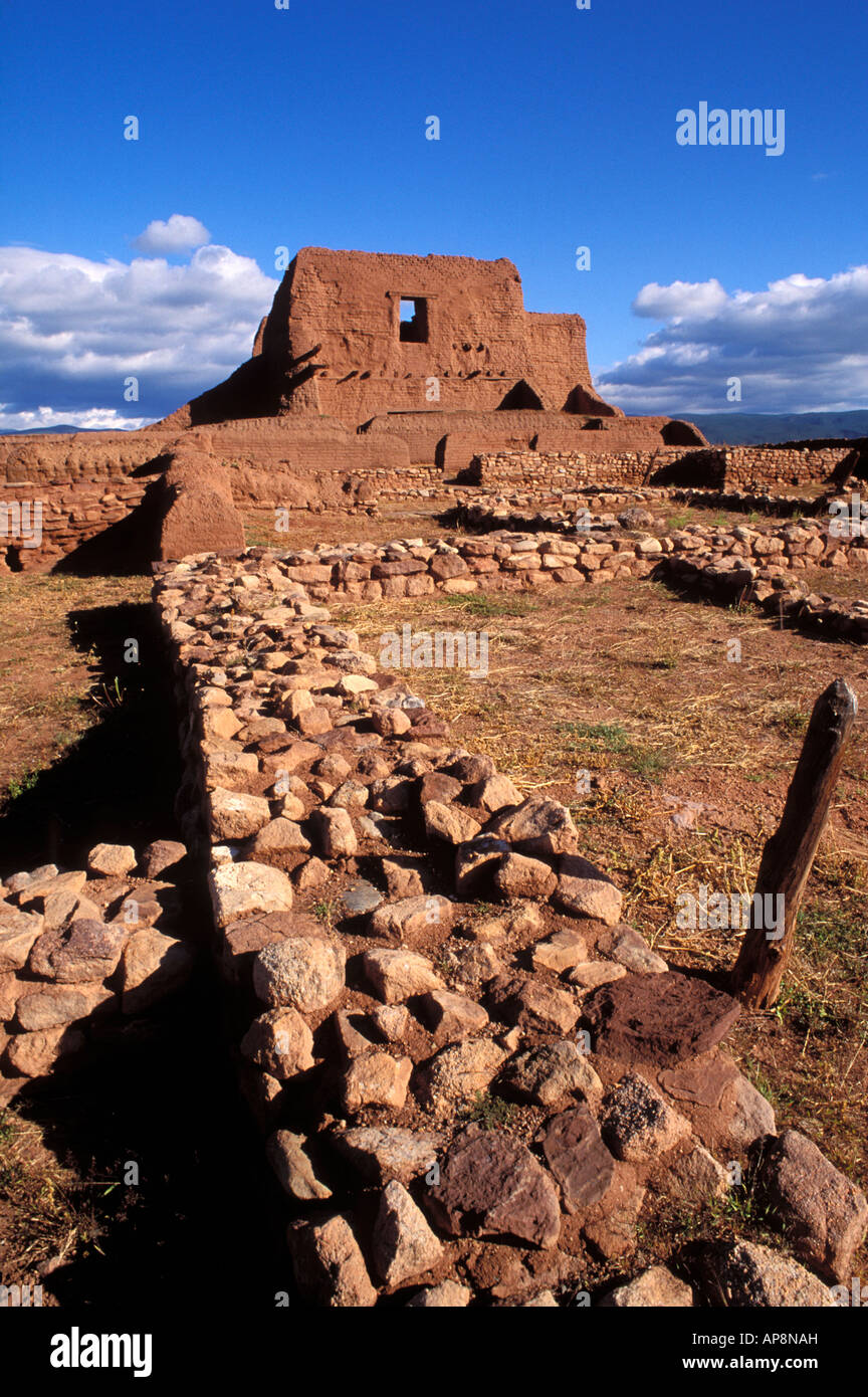 Morning light on the mission church and convento wall at Pecos Pueblo Pecos National Historic Park New Mexico Stock Photo