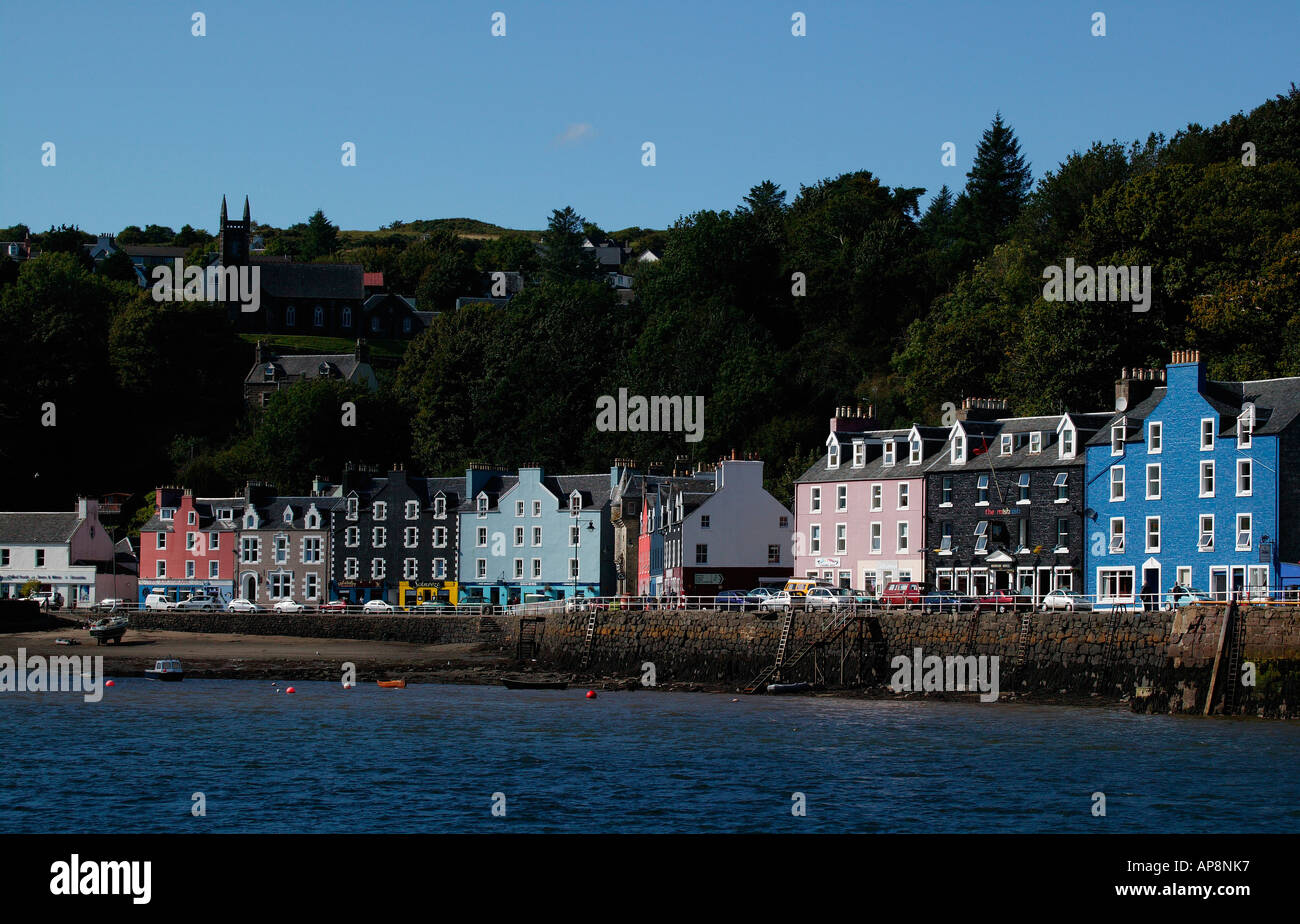 Brightly coloured houses of Tobermory, Isle of Mull in background, Sound of Mull, Scotland Stock Photo