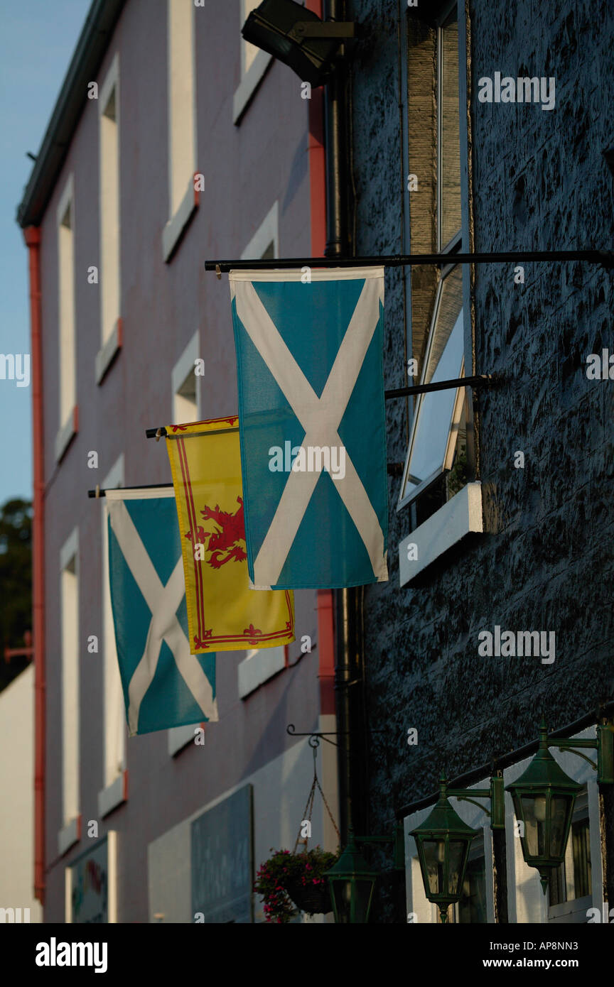 Saltire and lion rampant Scottish flags hanging in Tobermory, Isle of Mull, Scotland Stock Photo