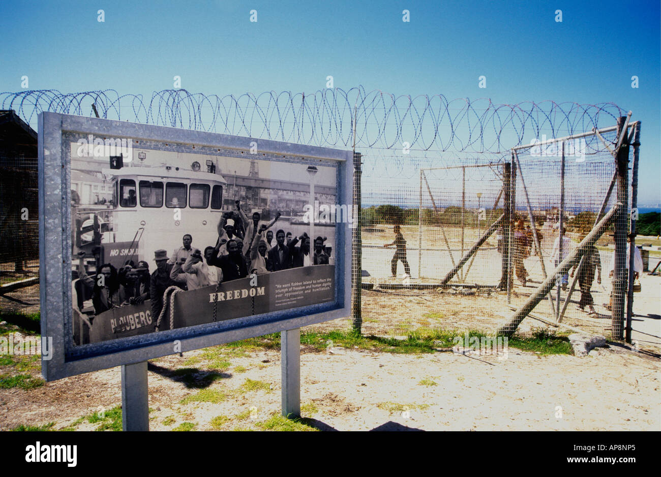 Exhibits and barbed wire fencing near the harbour of Robben Island near Cape Town South Africa Stock Photo