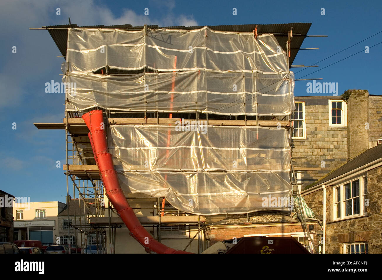old offices in truro,cornwall, being refurbished,covered with plastic sheeting for protection
