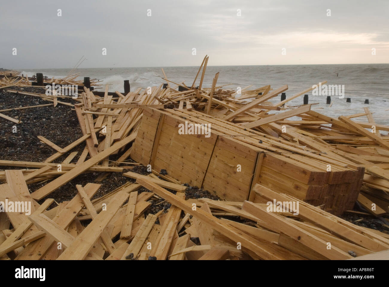Beach Worthing West Sussex England Planks of wood from freighter the “^Ice Prince” which sank in rough weather on January 15th Stock Photo