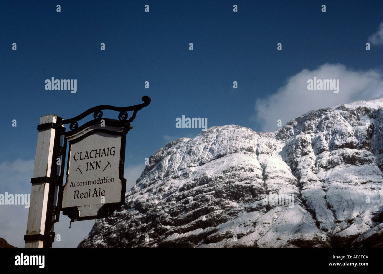 PICTURE CREDIT DOUG BLANE Clachaig Inn sigh post in winter snow Glen Coe Highlands Scotland United Kingdom of Great Britain Stock Photo