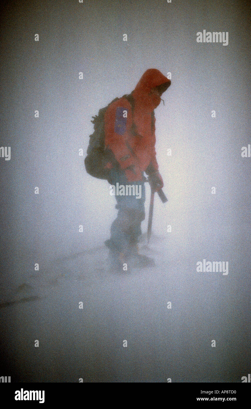 Mountaineering in a snow blizzard during winter in Glen Coe Highlands Scotland United Kingdom of Great Britain Stock Photo