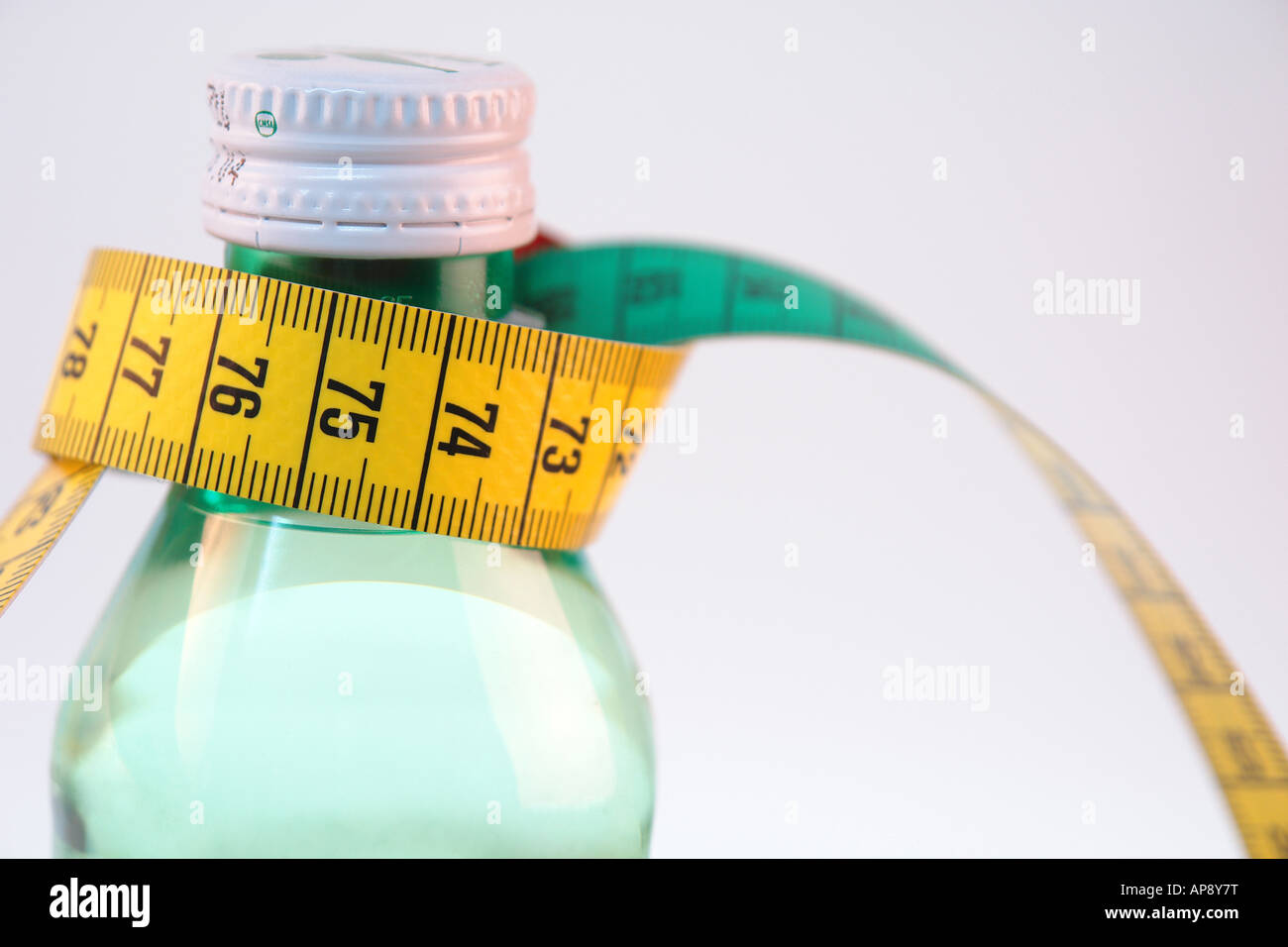 measuring tape with bottle Stock Photo Alamy