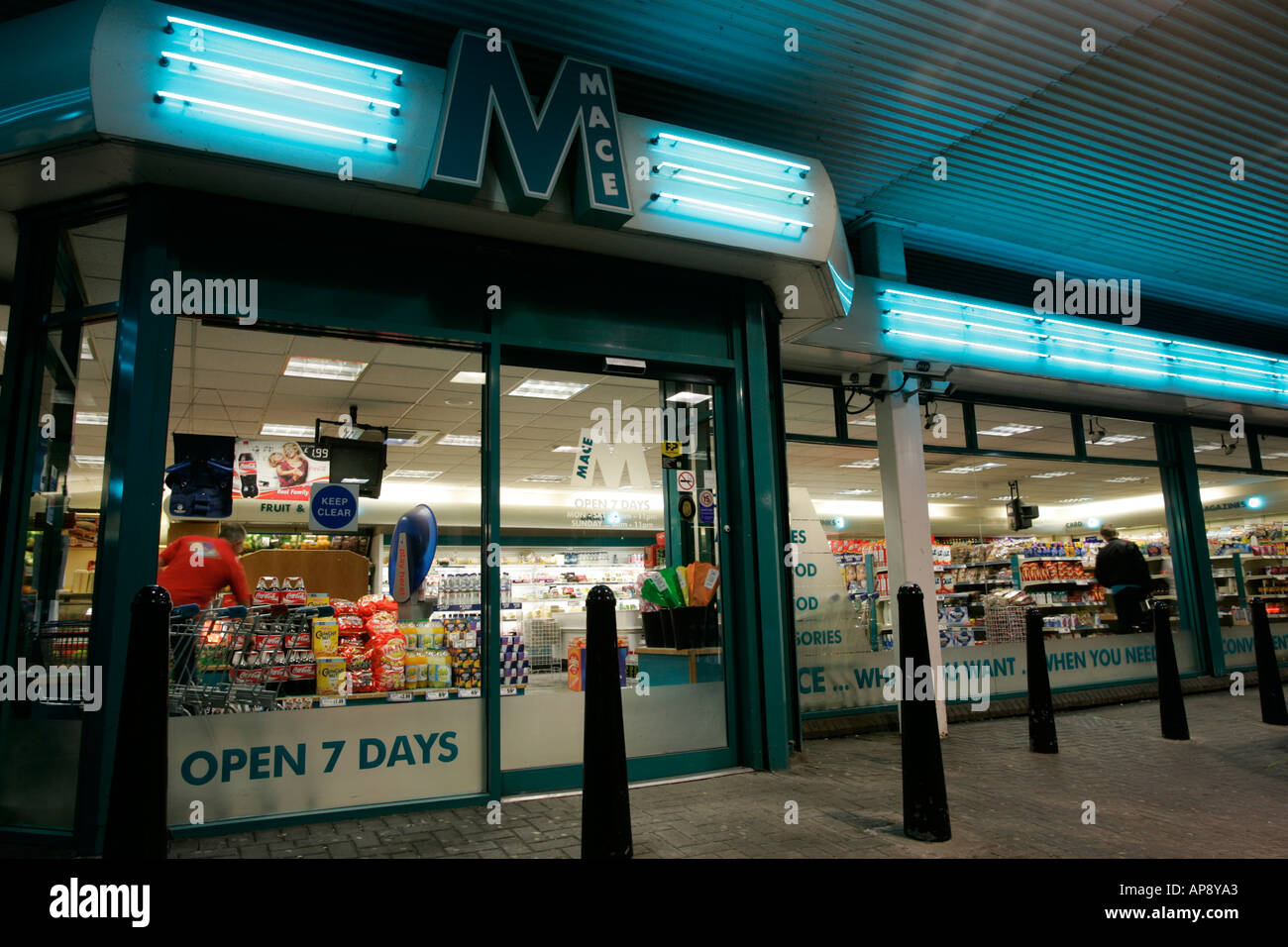 Mace shopping market in a petrol station garage forecourt at night