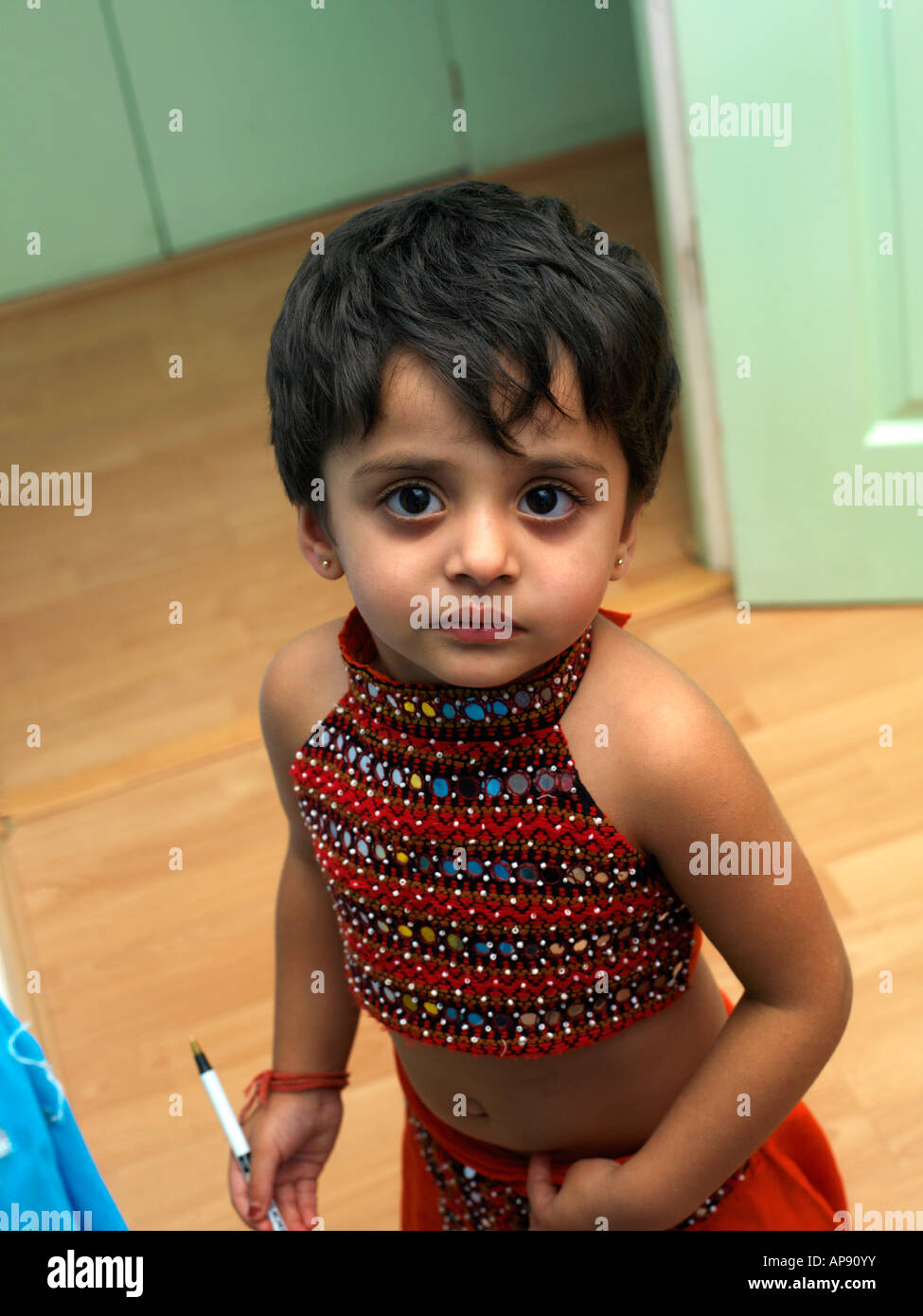 Diwali Cebrations at Home Tooting Two Year Old Wearing New Clothes for Diwali Stock Photo
