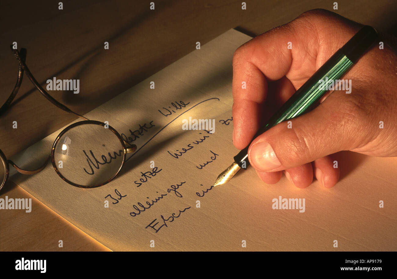 Man hand writing with fountain pen hi-res stock photography and images ...