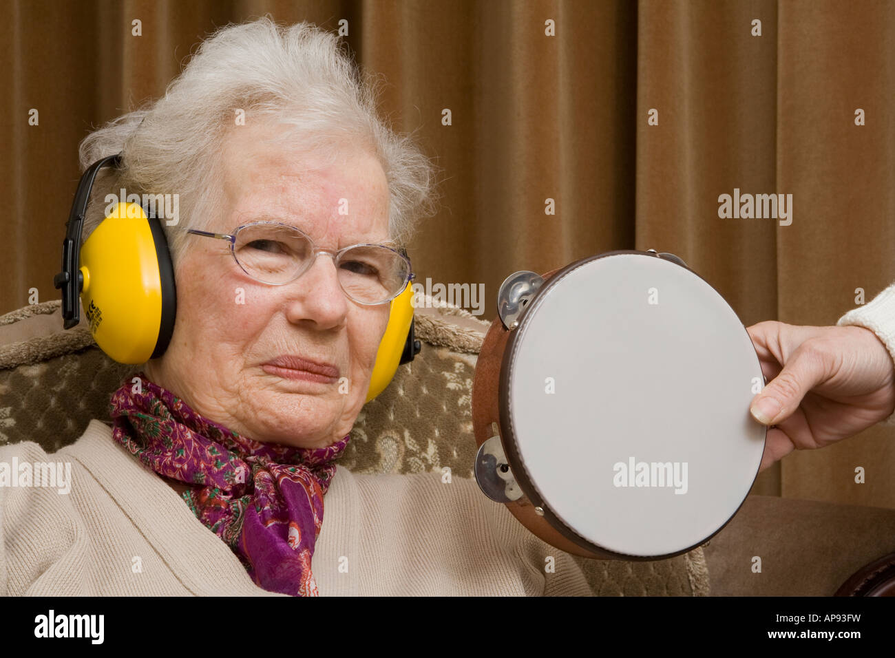 Lady wearing ear defenders hires stock photography and images Alamy