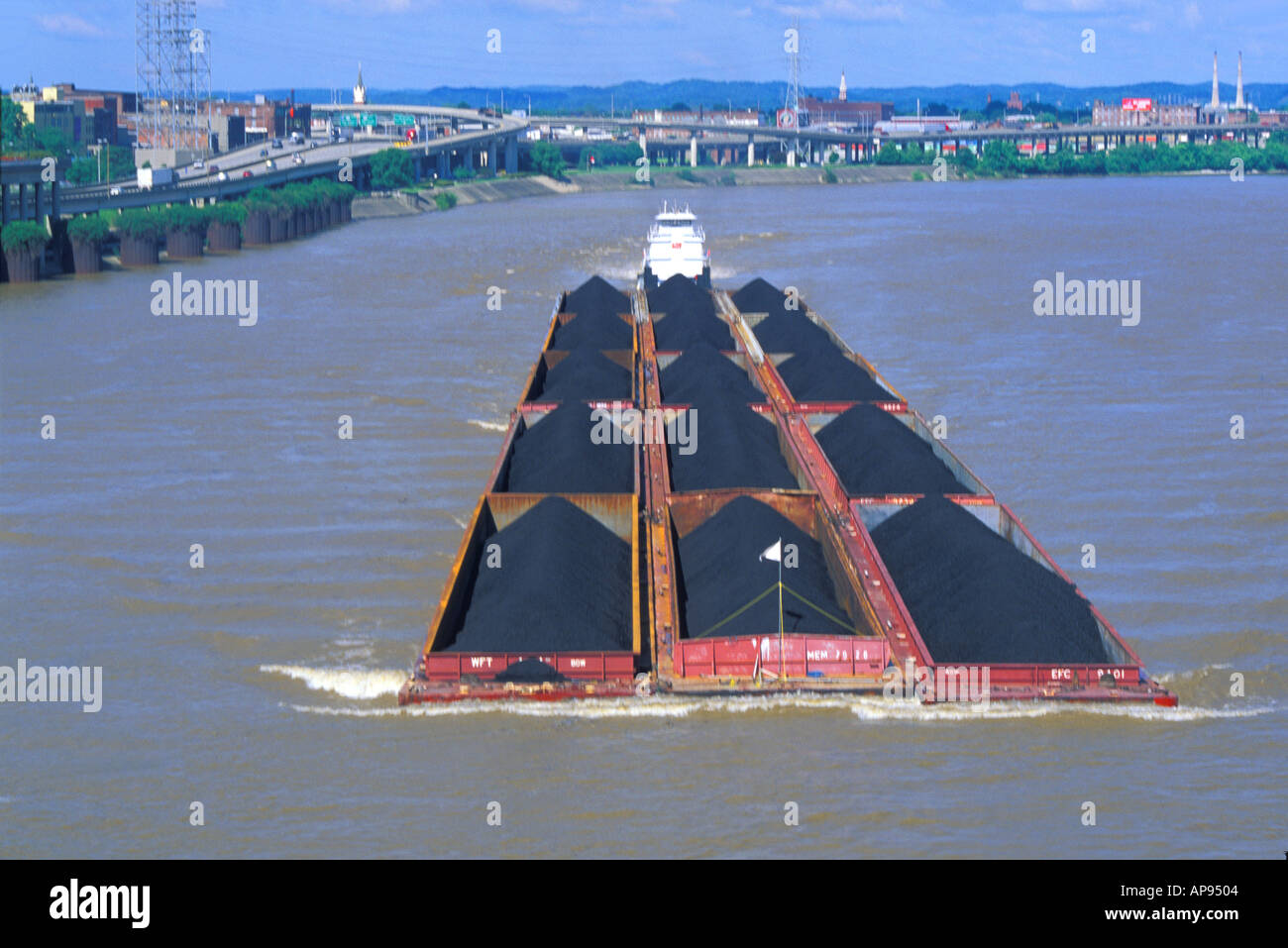 tugboat pushing coal barges up Ohio River Louisville Kentucky Stock