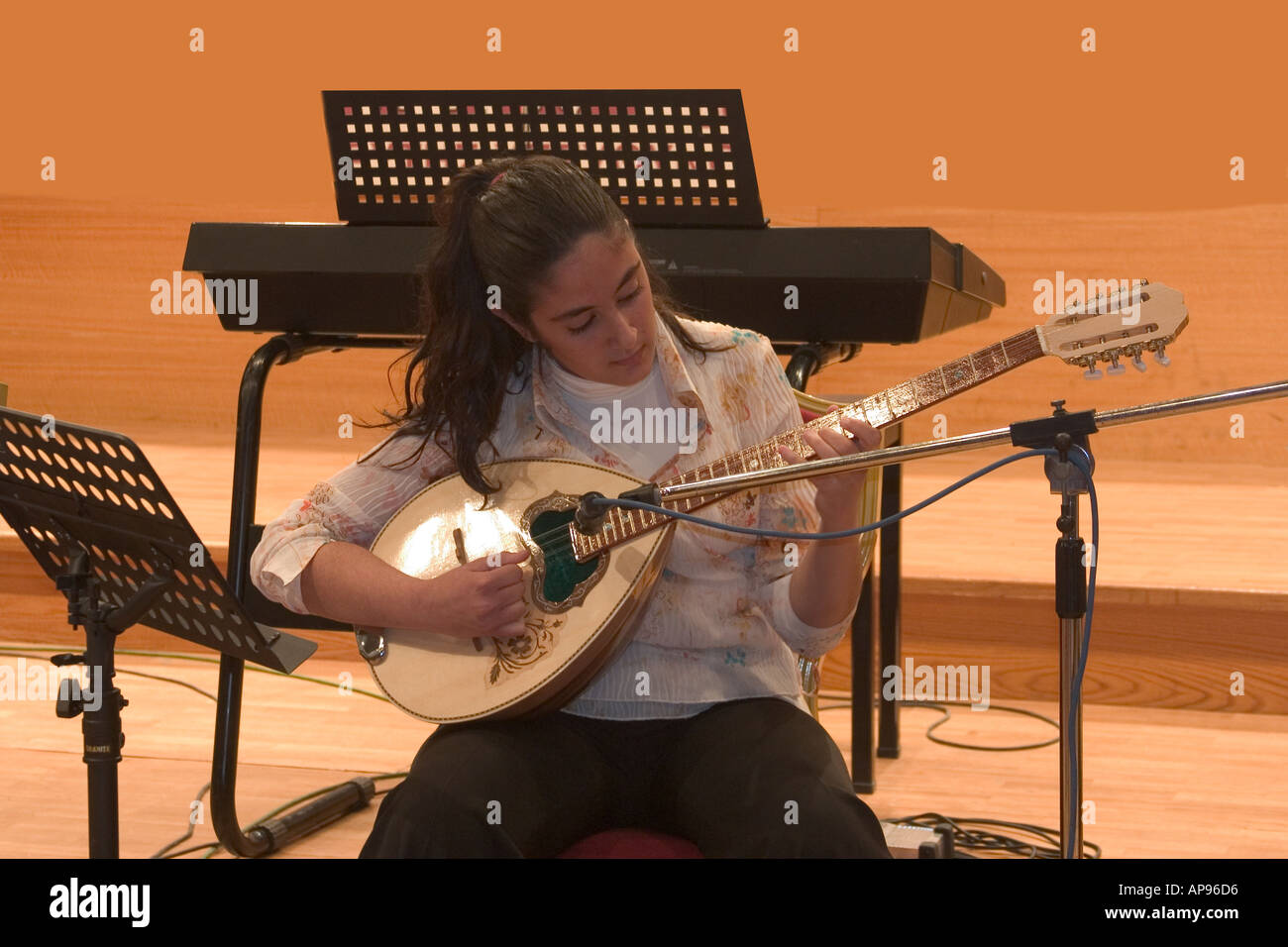 girl playing bouzouki Stock Photo Alamy