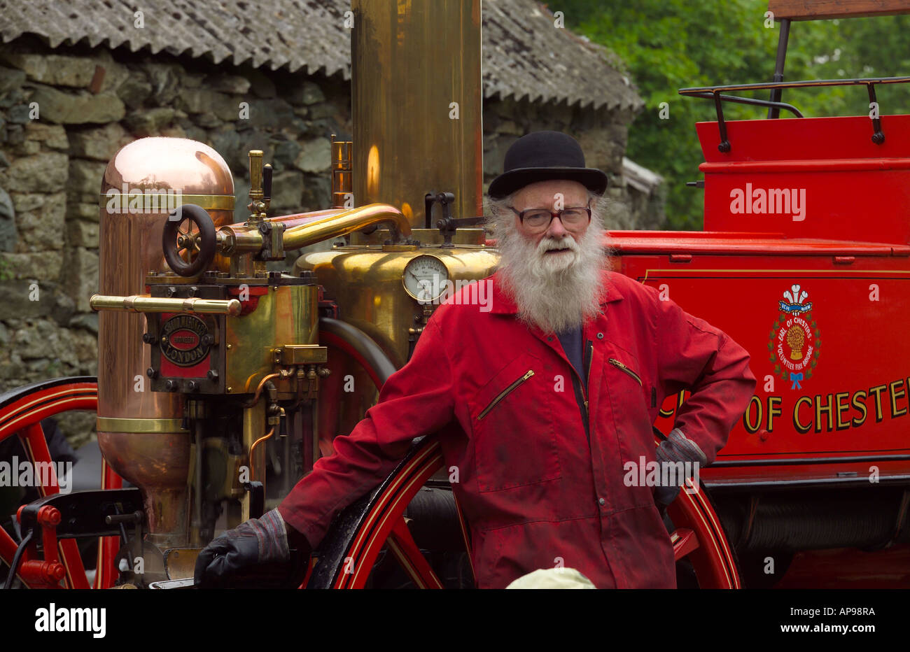 Man with Engine Steam Rally Henblas Park Anglesey North West Wales Stock Photo
