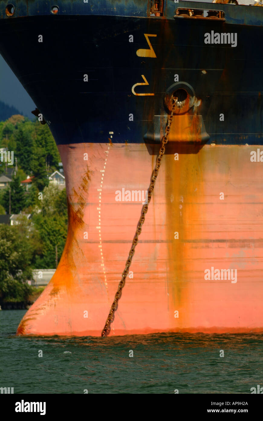 Bow and anchor chain of large cargo freight ship Stock Photo