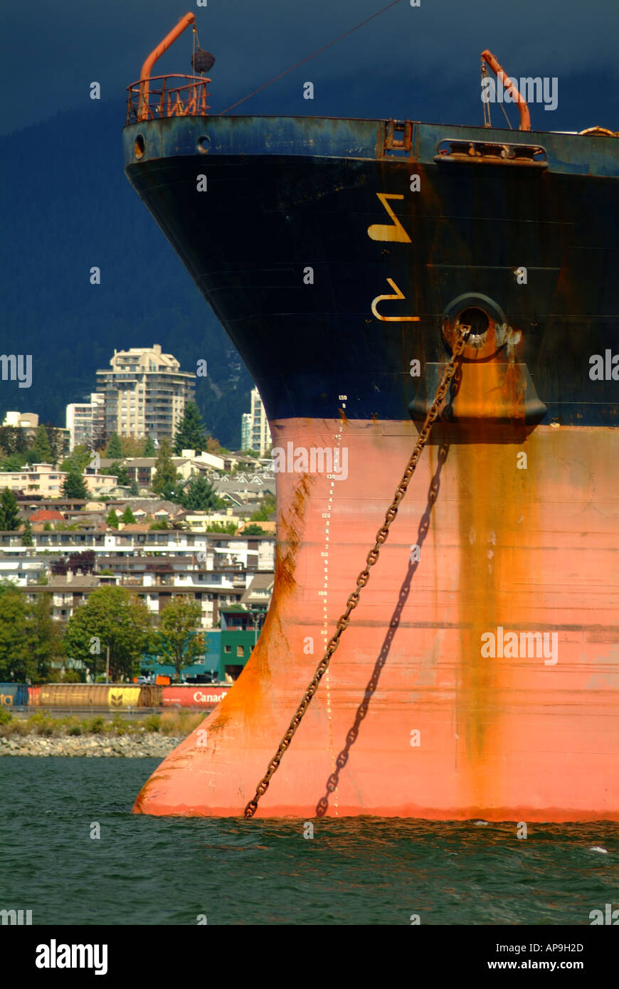 Bow and anchor chain of large cargo freight ship Stock Photo