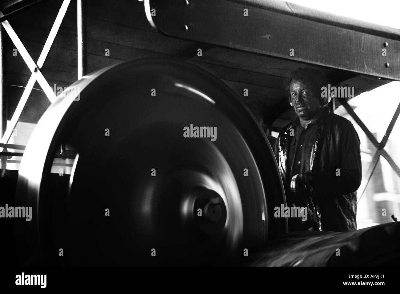 Man driving a traditional steam engine Stock Photo - Alamy