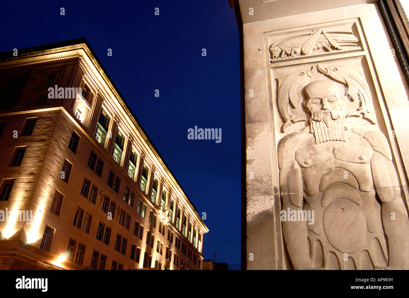 View of India Buildings Liverpool with carved stonework on Martins Bank Building in the foreground taken at night Stock Photo