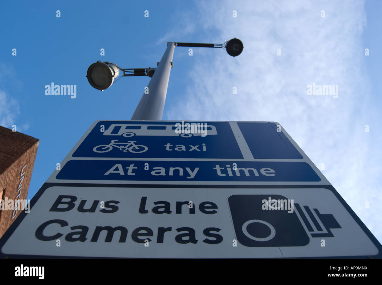 british bus lane sign indicating cctv cameras and permitted useage by