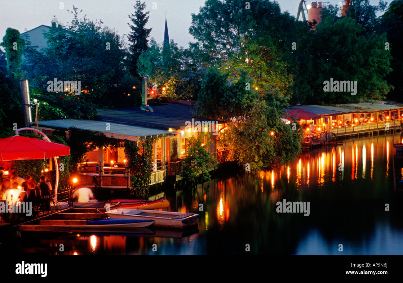 Berlin. Kreuzberg. Café Restaurant Freischwimmer on converted houseboats at an anabranch of the river Spree. Stock Photo