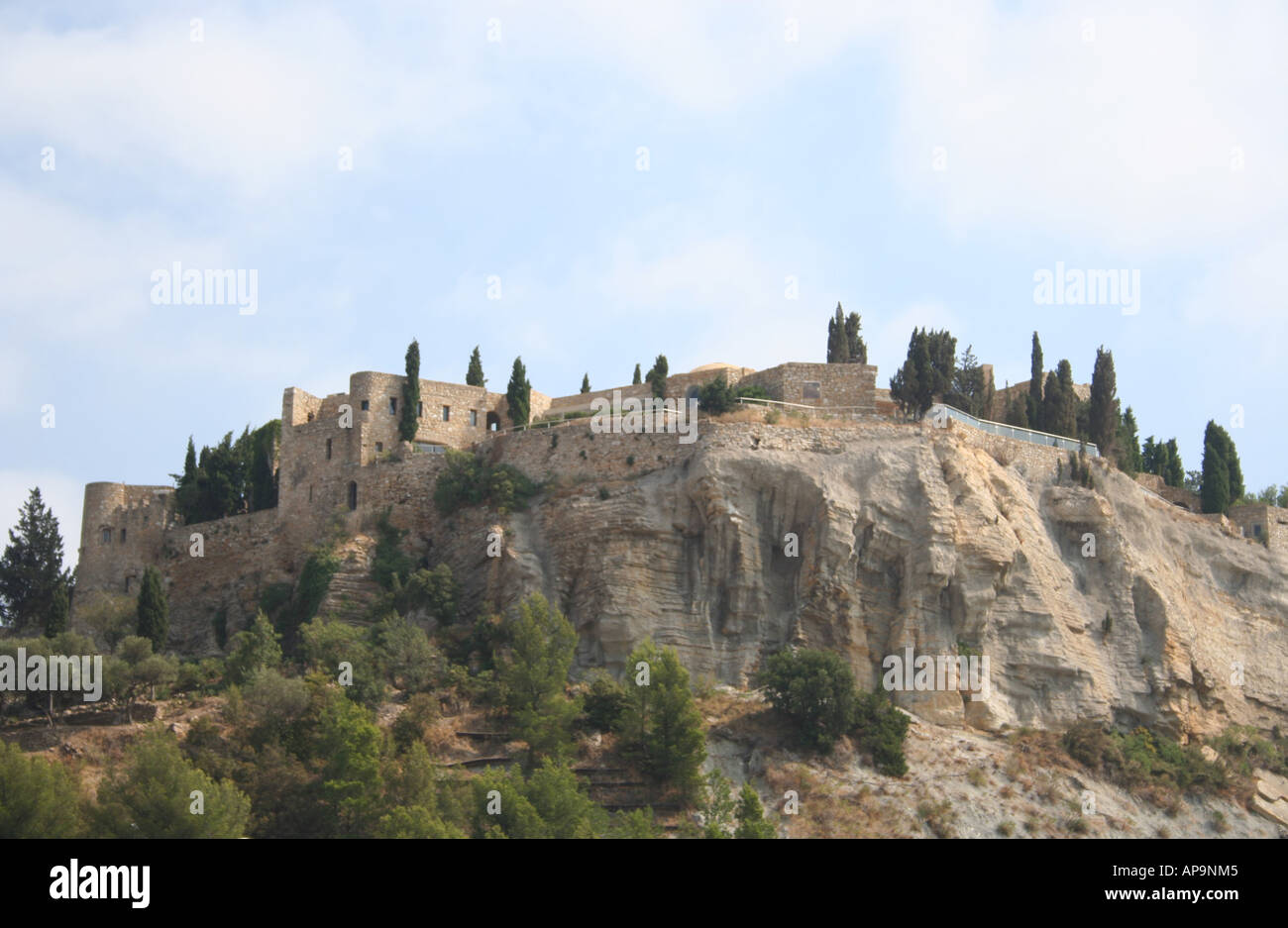 restored ancient ruin on cliffs above village of Cassis France ...