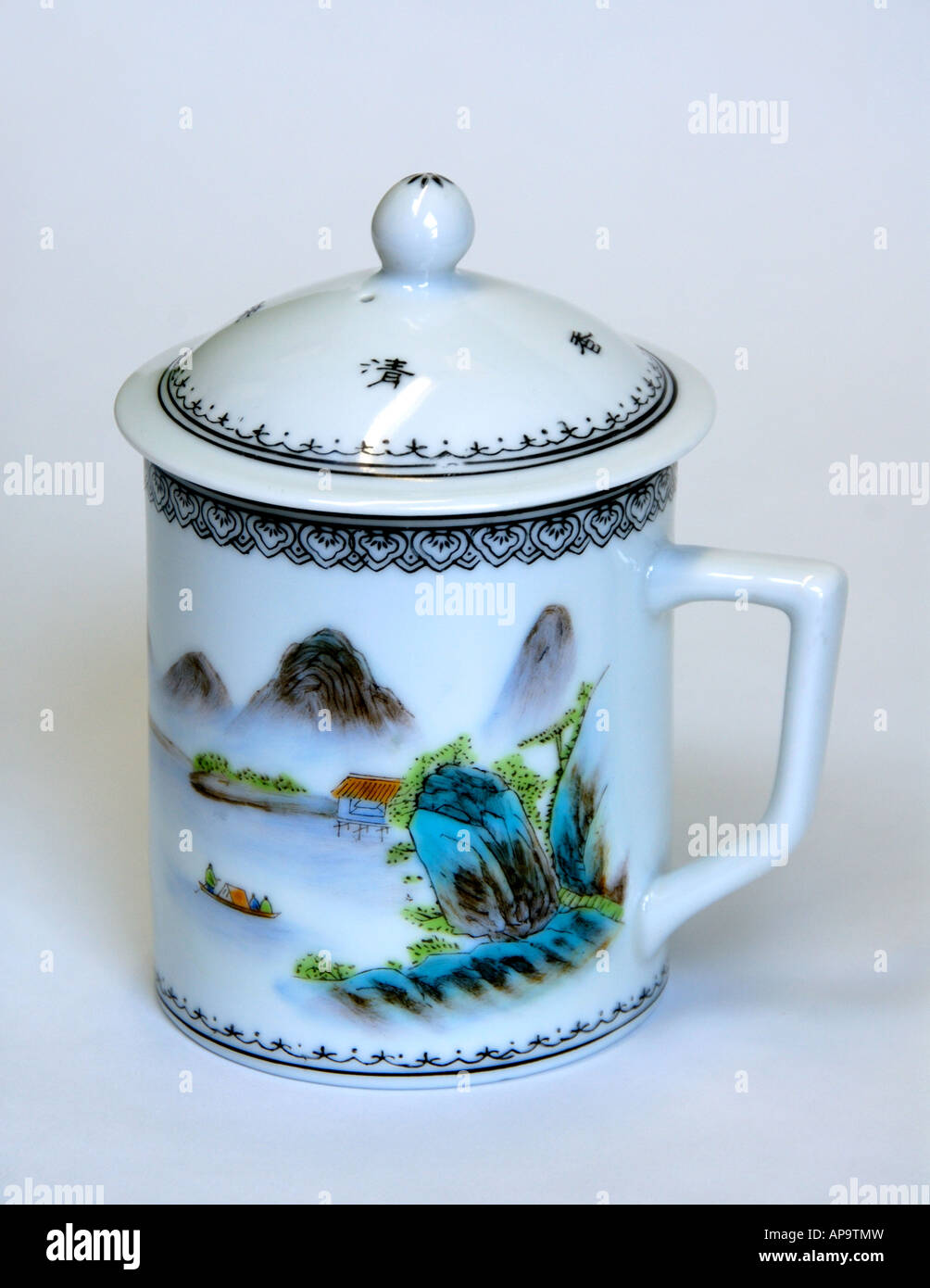 Chinese ceramic tea cup with lid, colour white with mountain and sea