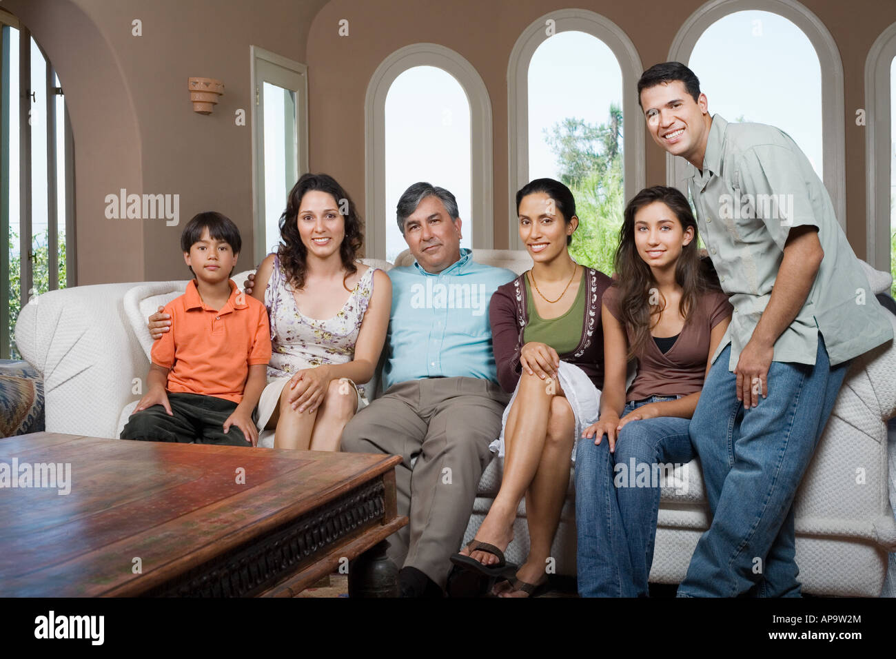 Family on sofa Stock Photo Alamy
