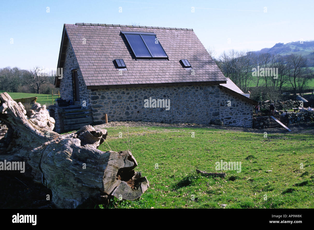 Solar water heating panels on a new barn conversion. Powys, Wales, UK. Stock Photo