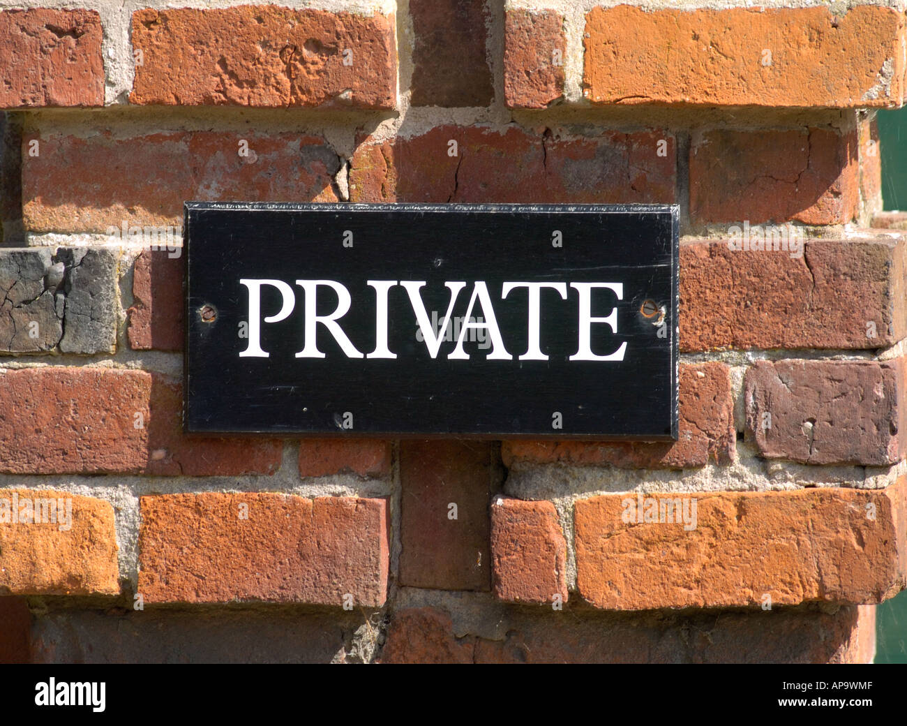 Private Sign on red brickwork wall Stock Photo - Alamy