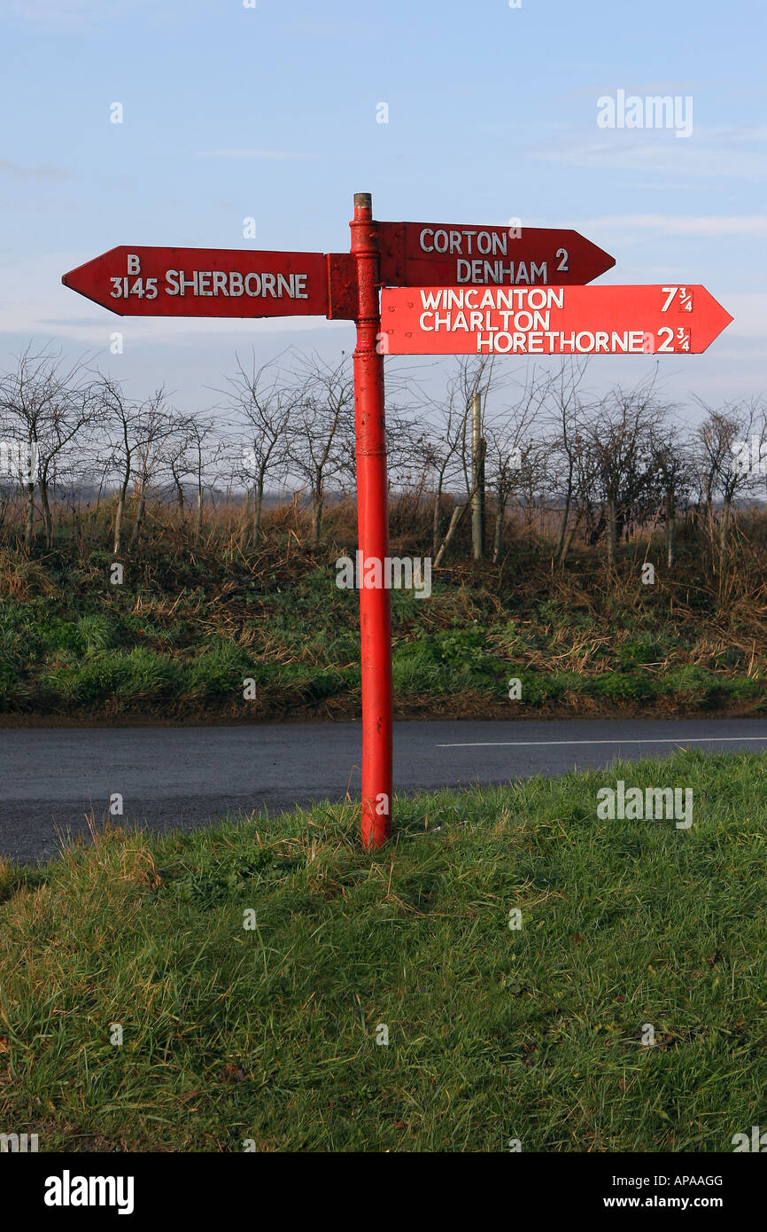 Sherborne Sign One of 3 Red Sign Posts in Dorset on B3145 north of Sherborne Stock ...