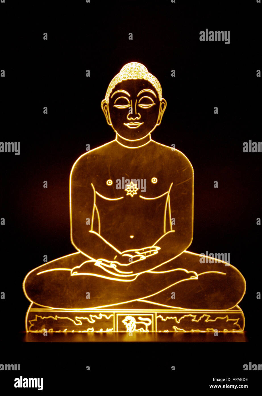 Indian God Lord Mahavir founder Jainism sitting posture glass sculpture India Stock Photo