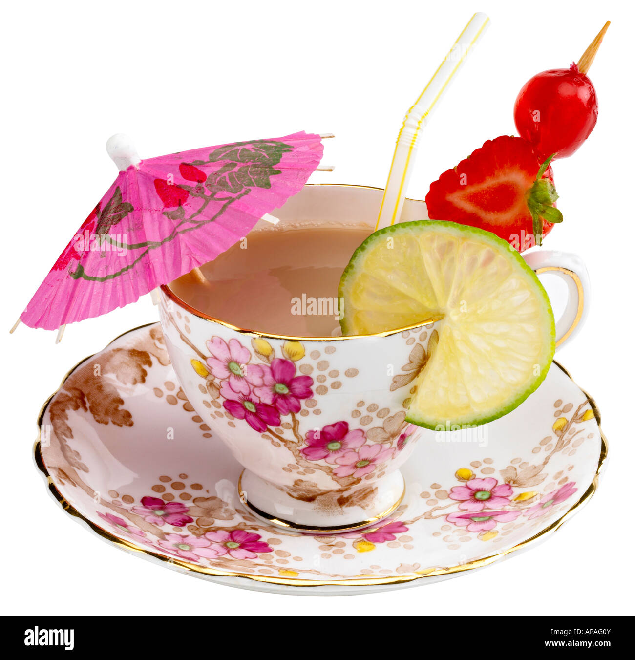 A teacup with the accoutrement's of a cocktail Stock Photo