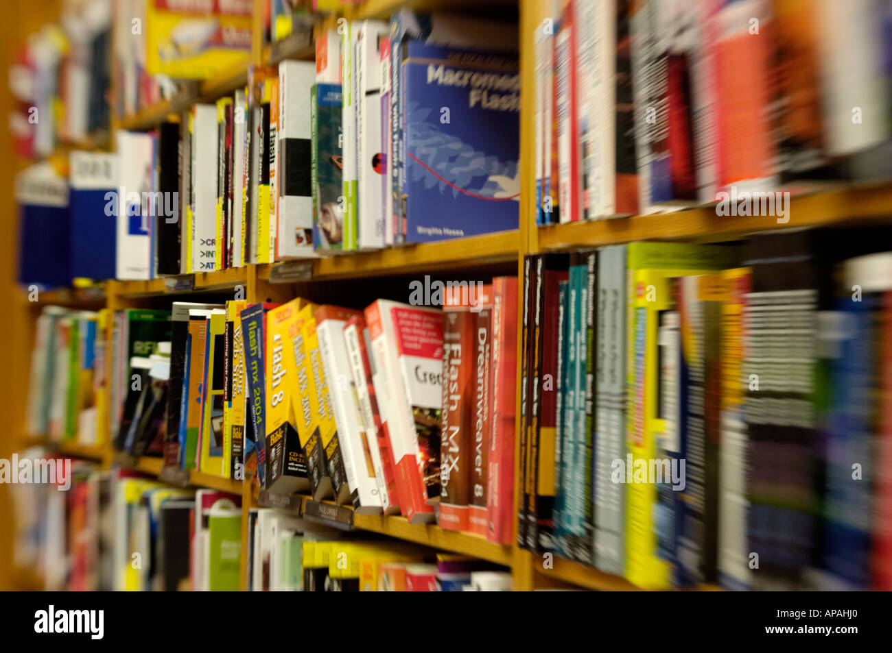 rows of books in shelves at a bookstore Stock Photo Alamy