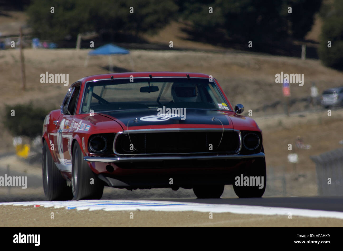John McClintock races is 1969 Mustang Boss 302 at the 33rd Rolex Monterey Historic Automobile Races 2006 Stock Photo