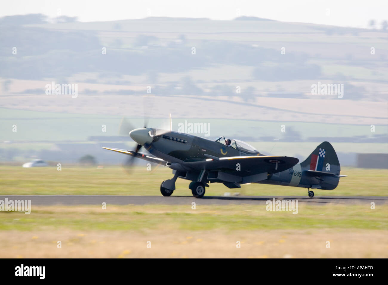 RAF Spitfire XVIII in 32 Squadron colours taking off Stock Photo