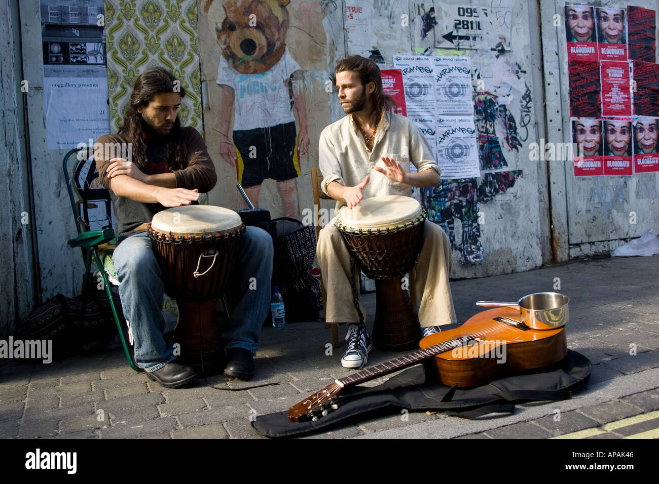 Street musicians playing drums 'Brick Lane' London, UK. Stock Photo