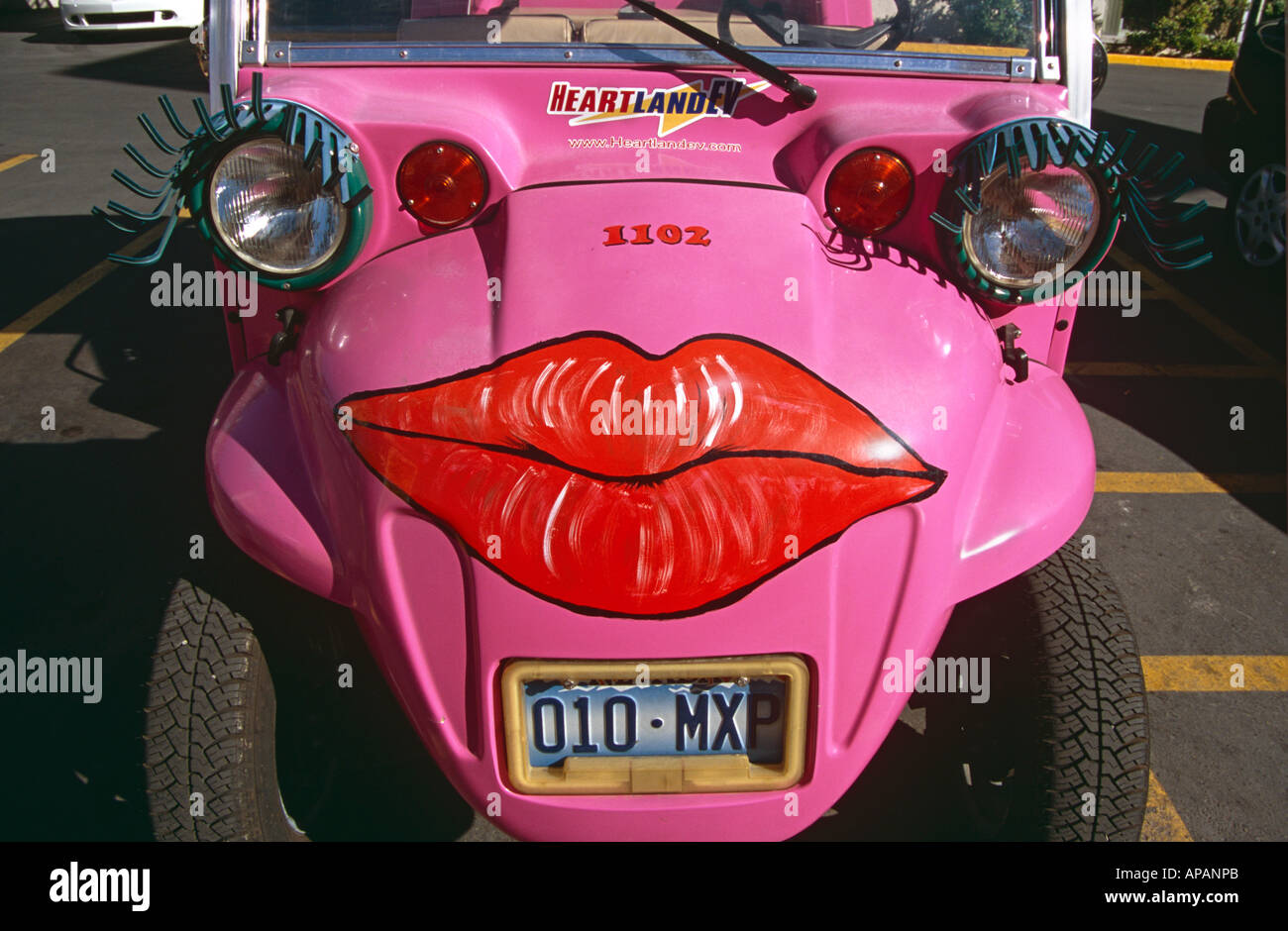 Brightly coloured car, with large painted lips, and eyelashes, Las