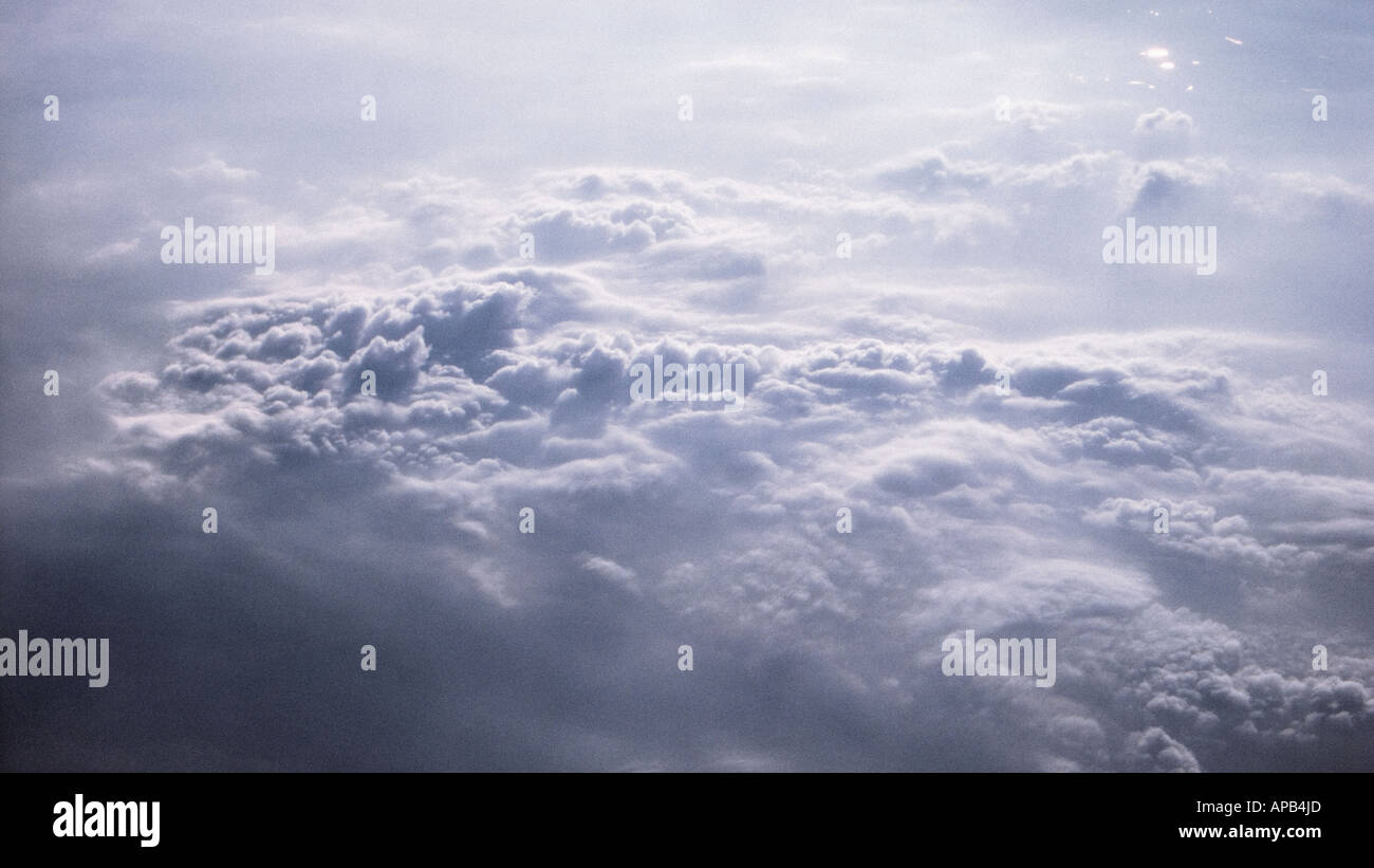 Sky above the clouds shot from an aeroplane Stock Photo