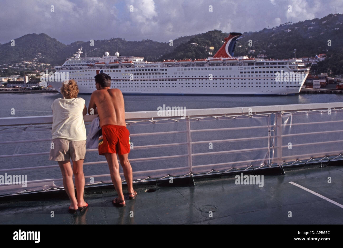 Castries St Lucia Couple Leaning On Ships Rails Looking Towards Larger Cruise Ship Inspiration Stock Photo Alamy