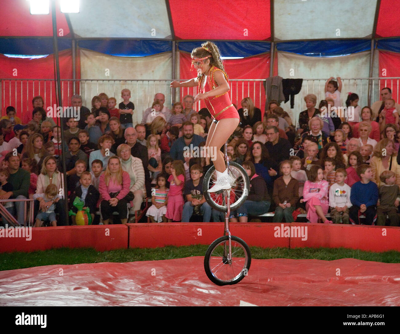 Unicyclist performing at a circus Stock Photo Alamy