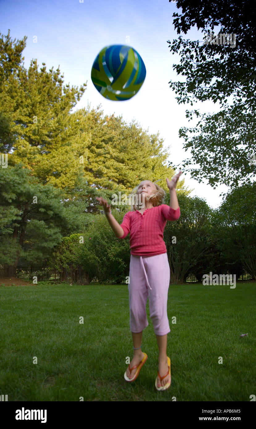 Child tossing ball air hires stock photography and images Alamy