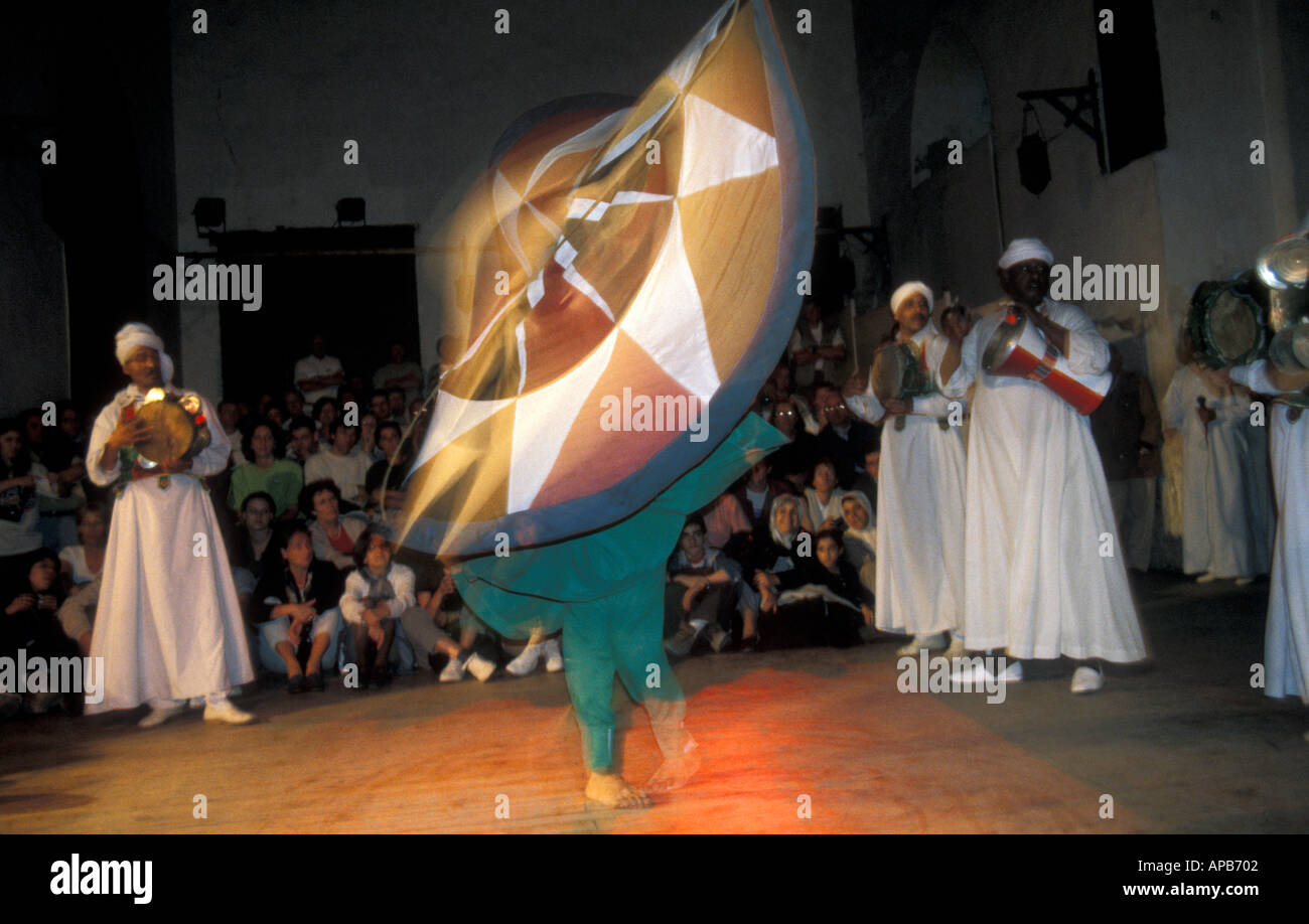 The Al Tannoura Egyptian Heritage Dance Troupe performing traditional Sufi dance in Cairo Egypt Also known as the Whirling Derv Stock Photo