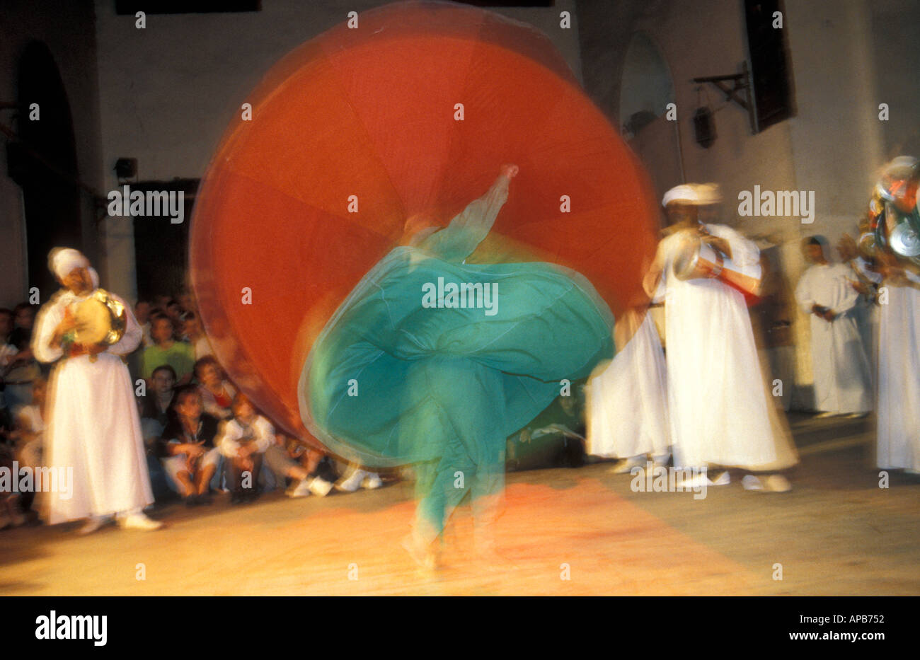 The Al Tannoura Egyptian Heritage Dance Troupe performing traditional Sufi dance in Cairo Egypt Also known as the Whirling Derv Stock Photo