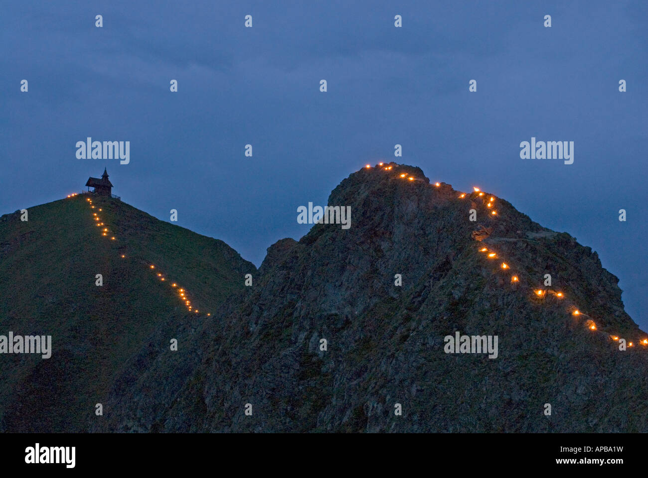 Midsummer festival bonfire on the moutain Kellerjoch (2 344 m), Tyrol Stock Photo