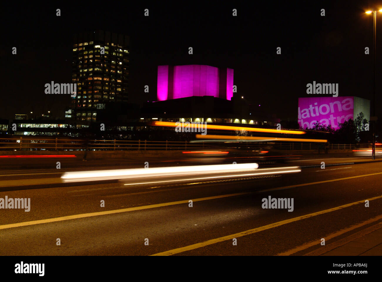 Waterloo Bridge shot at night with a slow shutter speed capturing the moving cars London England Stock Photo