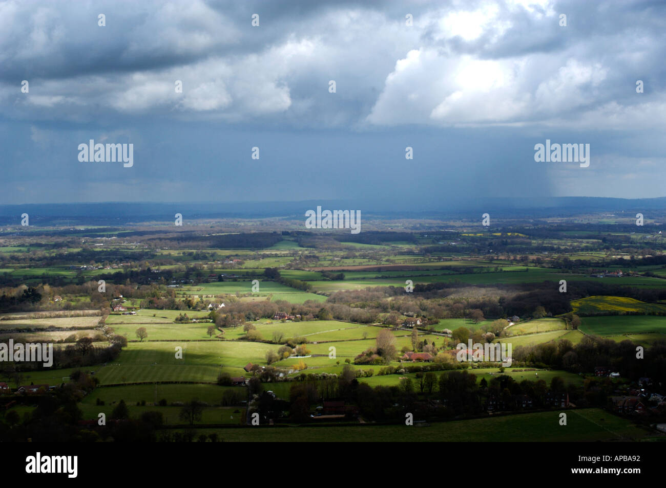 Rain storm over The Weald West Sussex England from Ditchling Beacon Stock Photo