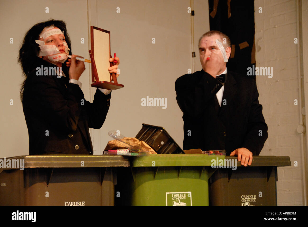 Performance artists Wladyslaw Kazmierczak & Ewa Rybska during a performance at Tullie House Carlisle, Cumbria, UK Stock Photo